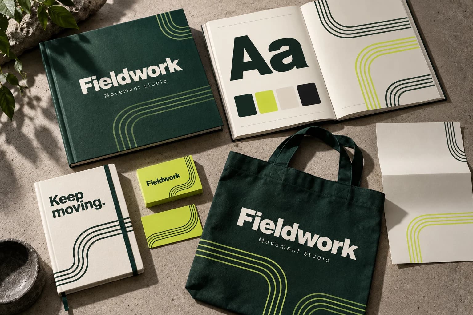 Fieldwork identity presentation with a guideline booklet, typography and colour specimens, and coordinated stationery applications.